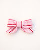 Pink and red striped bow on a white background